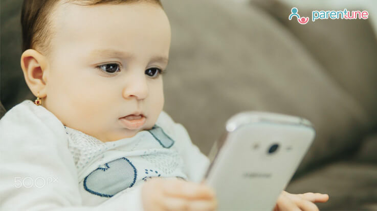 baby with mobile